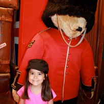 Mia with a stuffed Bear Guard!